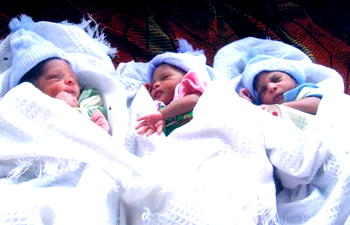 Triple bundles of joy for couple after 8 years of waiting