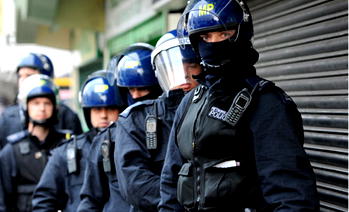 Police flood London streets to prevent new riots