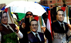 Mubarak arrives court in cage, trial adjourned for three weeks