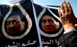 Egypt’s Mubarak on trial for murder as protesters clash