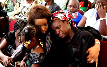 Tears flow for UN house blast victims