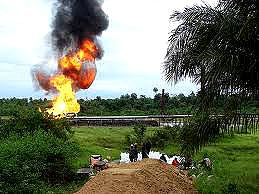 Oil fire, victims