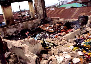 Fire victims count losses, mourn dead colleagues