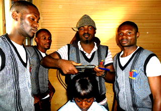 In Jos, male graduates are going into  hair dressing