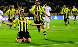 Lewandowski hits four as Dortmund rout Real