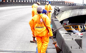 Lagos street sweepers groan under poor pay