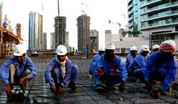 Dubai: Less work for locals, more work for migrants