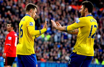 Premier League: Arsenal seven points  clear