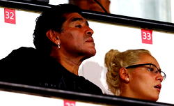 Brazil fans swarm Diego Maradona at World Cup