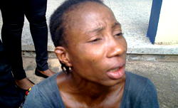 Police parade robbers, woman for axing husband to death