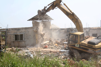 Furore, lamentations over demolition of structures under high tension cables