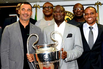 Fashola receives Champions League trophy in Lagos