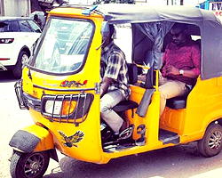 John Dumelo’s  Tricycle ride  in Lagos