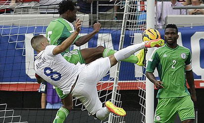 Clint Dempsey Makes Face at Jamaican Player