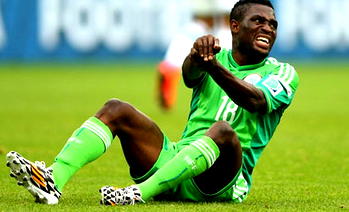 Babatunde watches Eagles from the sidelines