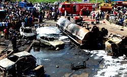 20 escape death as fuel tanker crashes into cars, trailer in Aba