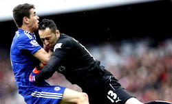 Chelsea’s Oscar taken to hospital after blow