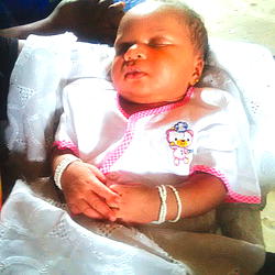 Baby born with traditional beads in Lagos