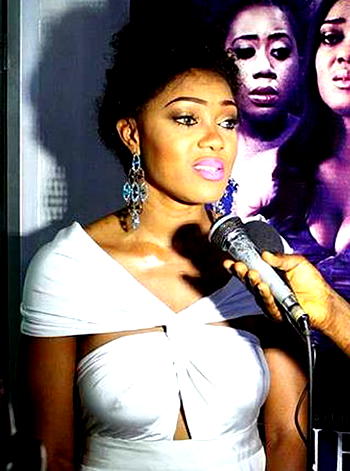 Peggy Ovire exposes nipples
