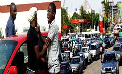 Painless abolition of fuel subsidy with dollar warrants