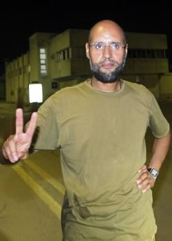 Gaddafi’s son Saif Islam safe in Libya, soon to give televised speech