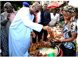 Fayose at it again, storms Ekiti market to buy soup ingredients
