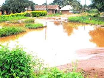 Flood ravages Edo-Delta link road, cuts off Alihame community