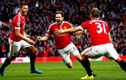 Martial sends Man Utd second, Liverpool held