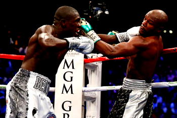 Mayweather beats Berto and says ‘it’s over’