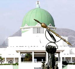Senator presents score card to constituents
