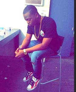 Olamide loses dad