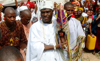 Photos: Ooni of ife, Oba Enitan Ogunwusi presented with the Aare crown