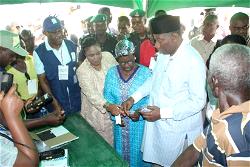 Photos: Jonathan, wife and mother during accreditation in Bayelsa