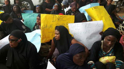 Pro-Faleke protesters lay siege to INEC office