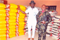Lawmaker distributes 450 bags  of rice to constituents