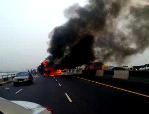 One dies as 18 passengers bus tumbles, bust into flames on TMB