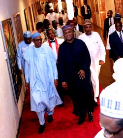 Photos: Buhari hosts National Lawmakers, APC chieftains