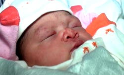 Italian woman returns mixed-race baby to surrogate