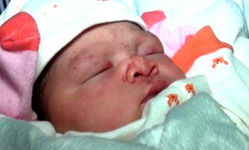 Italian woman returns mixed-race baby to surrogate