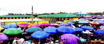 A disaster waiting to happen as Bomadi market women trade on bridge