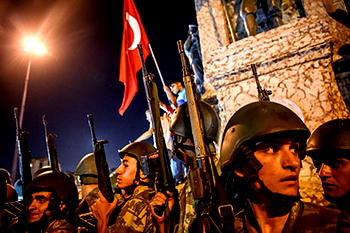 Turkey  sacks  9,000 officials in crackdown against suspected coup plotters