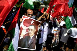 Thousands protest UN job cuts in Gaza
