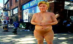 Trump supporters hit back, release naked portrait of Clinton with bottle of beer