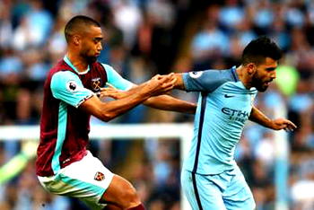 Aguero charged over Reid elbow