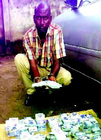 Counterfeiter arrested, accomplice declared wanted