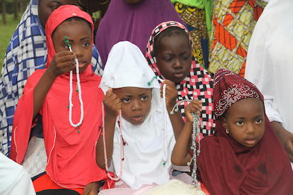 Photos: Muslim faithfuls at Abuja praying ground - Vanguard News