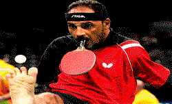 Paralympian with no arms plays Ping Pong with his mouth