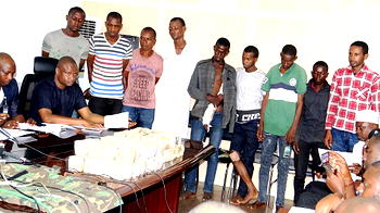 Photos: @NPF parade kidnappers of CBN Governor’s wife, display huge money, items recovered