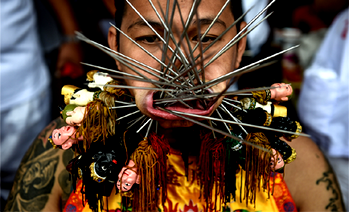 Swords and skewers at Thailand’s gruesome vegetarian festival