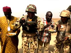 Photos: Buratai finally takes breakfast with 112 Task Force Battalion after ousting Boko Haram